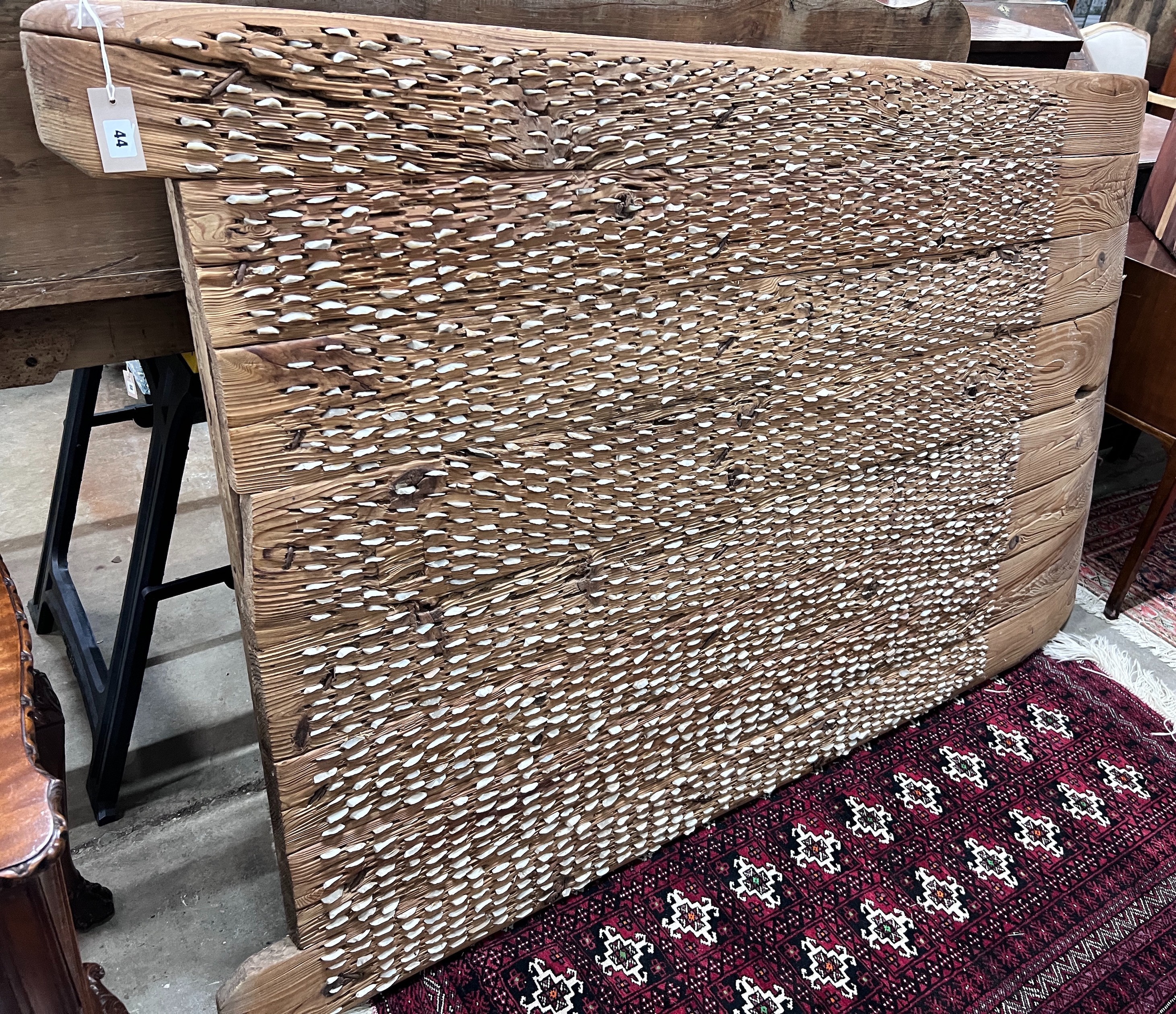 A vintage shell and planked pine threshing board, length 198cm, depth 121cm *Please note the sale commences at 9am.